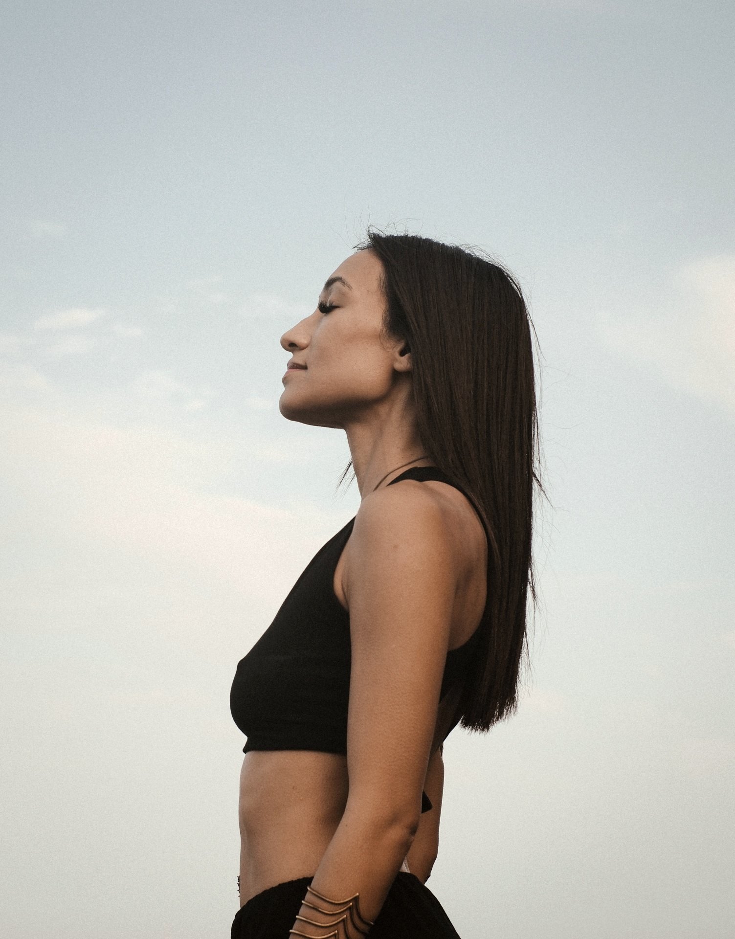 Consciousness Expansion: Mona Hassan profile against the sky